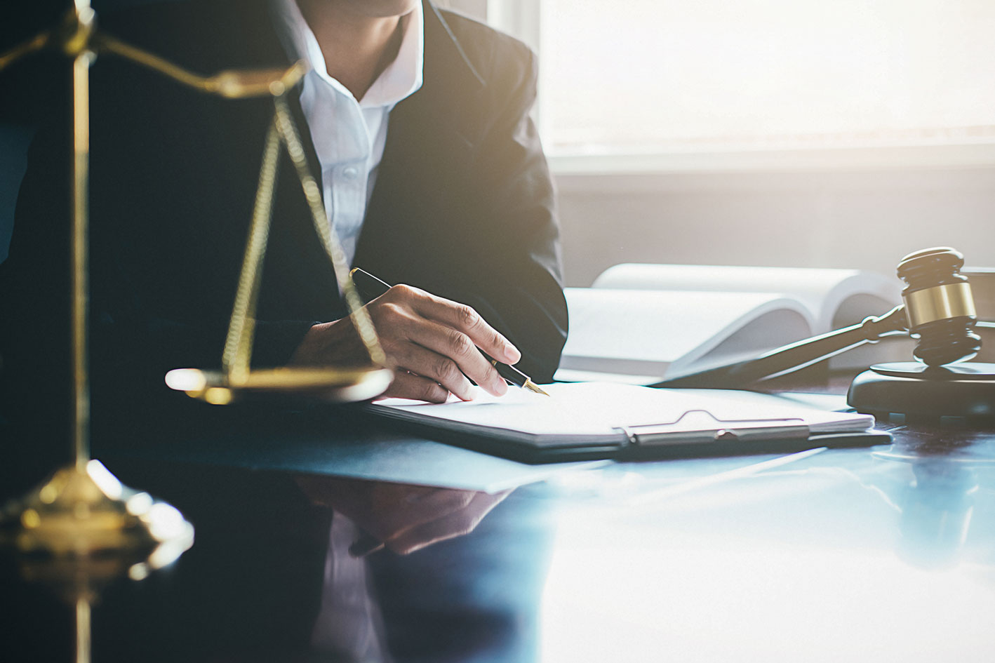 photo of an estate litigation lawyer with a client