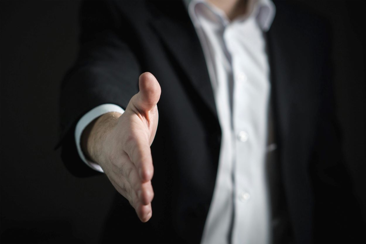 photo of an insurance adjuster trying to entice a settlement offer for an accident injury case